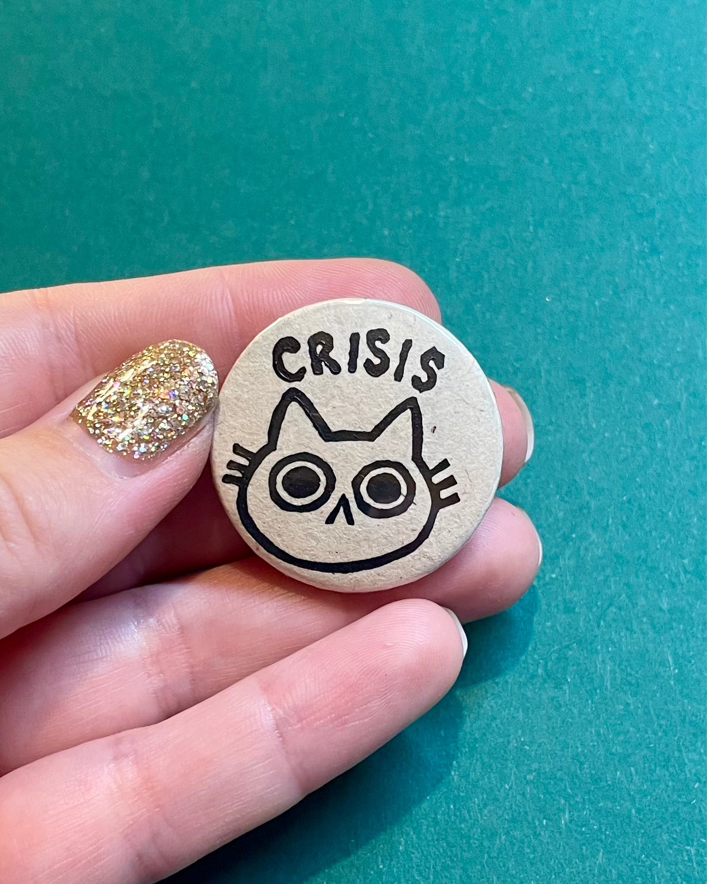 CRISIS Cat Badge